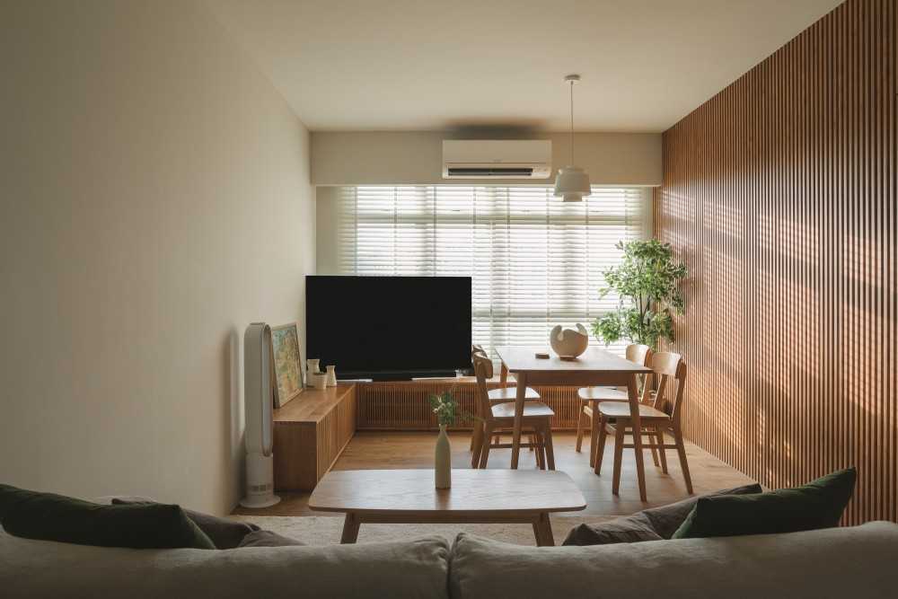 Modern Living Room with TV Console and Drop Light