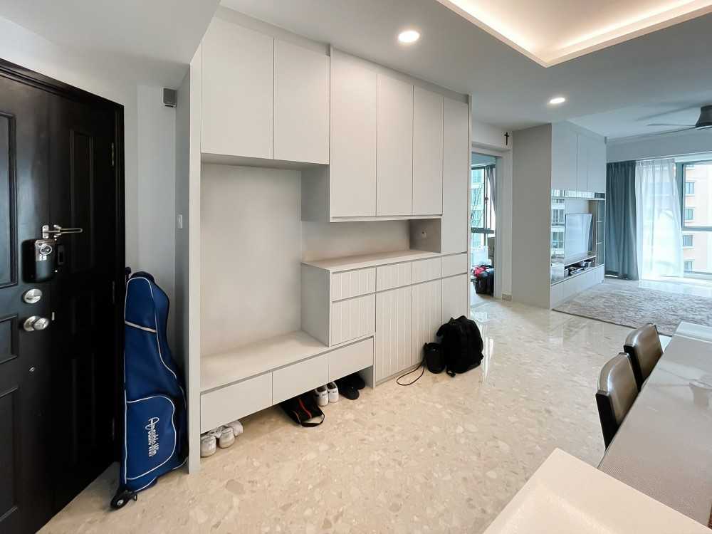 Scandinavian Foyer with Window Grille and Storage Cabinets