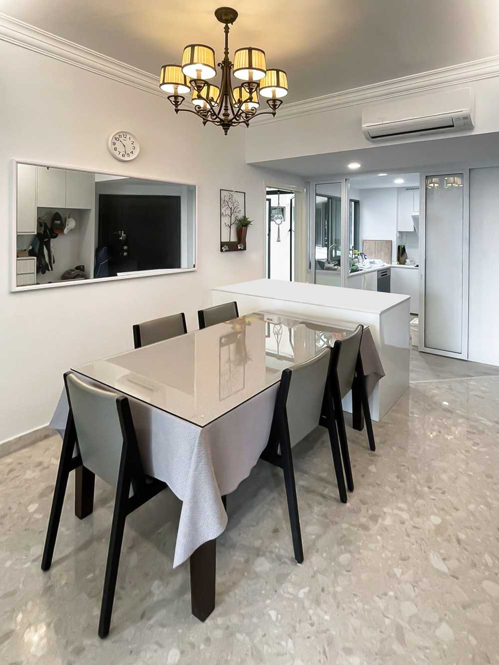 Scandinavian Dining Room with Mirror and Glass Door