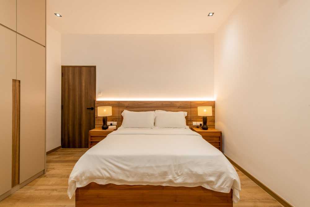 Contemporary Bedroom with Parquet Floor and Ceiling Light