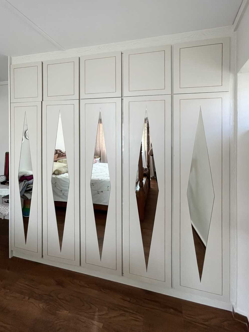 Scandinavian Bedroom with Wardrobe and Paintings