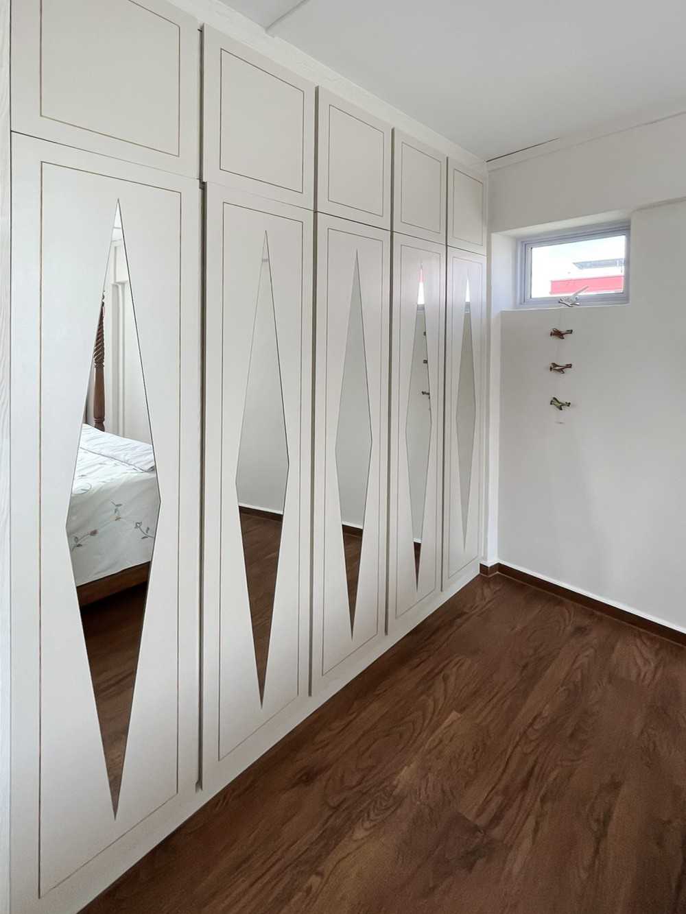 Scandinavian Bedroom with Wardrobe and Window Grille