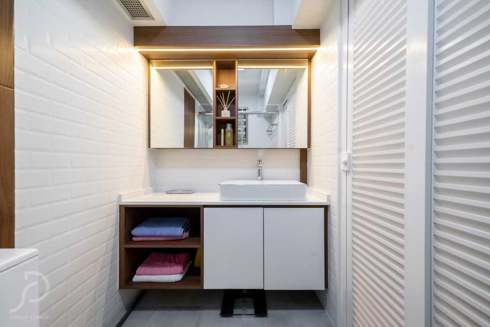 Contemporary Bathroom with Herringbone Tiling and Mirror