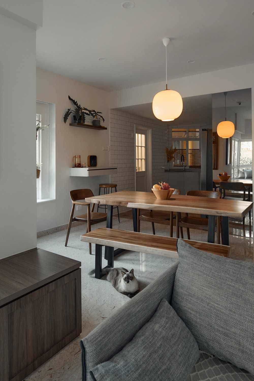 Contemporary Dining Room with Drop Light and Dining Table