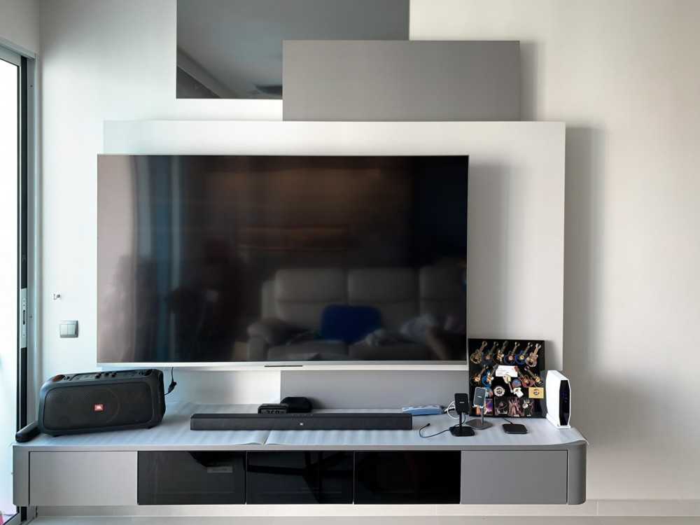 Scandinavian Living Room with TV Console and Feature Wall