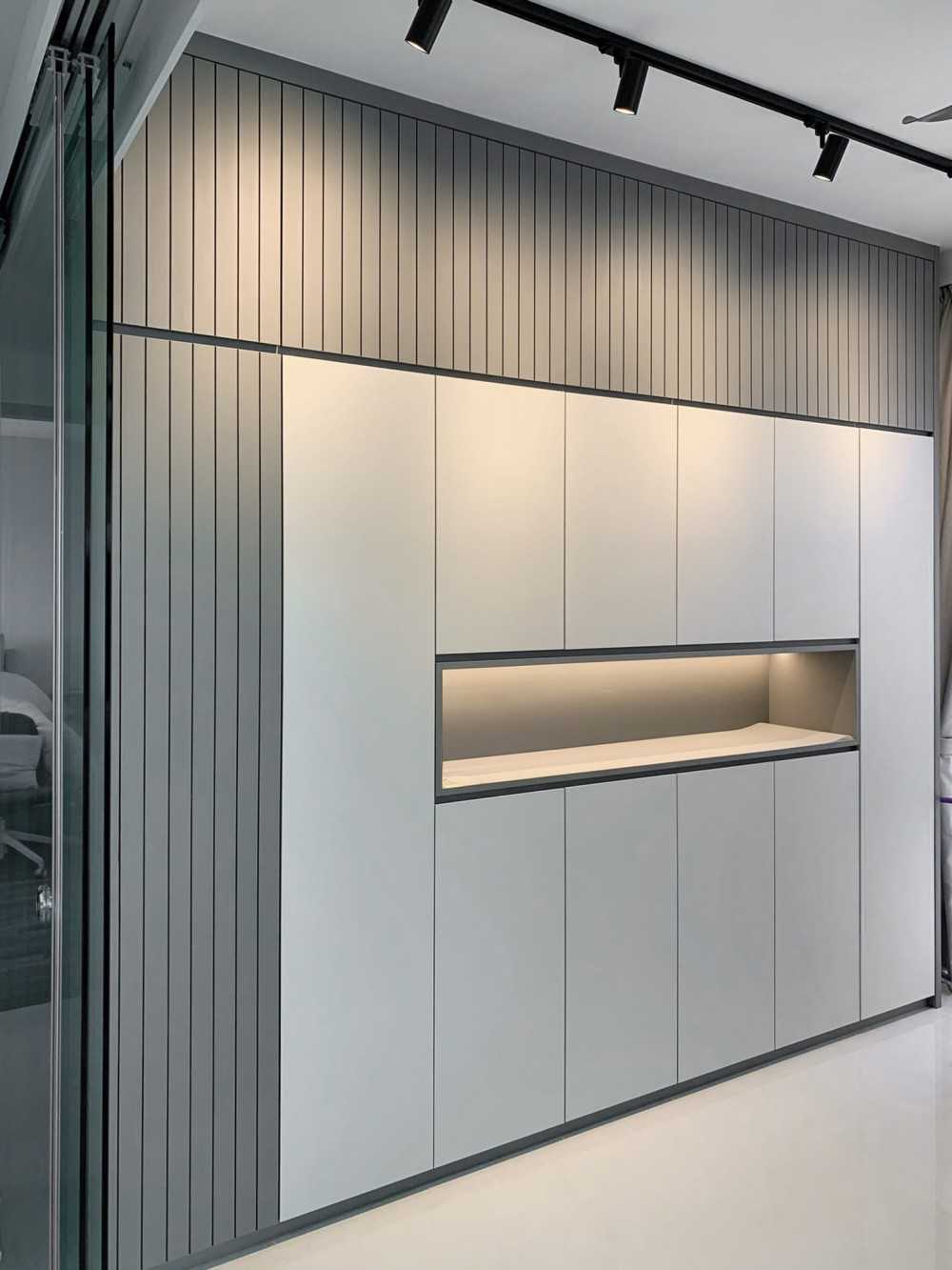 Scandinavian Foyer with Feature Wall and Storage Cabinets