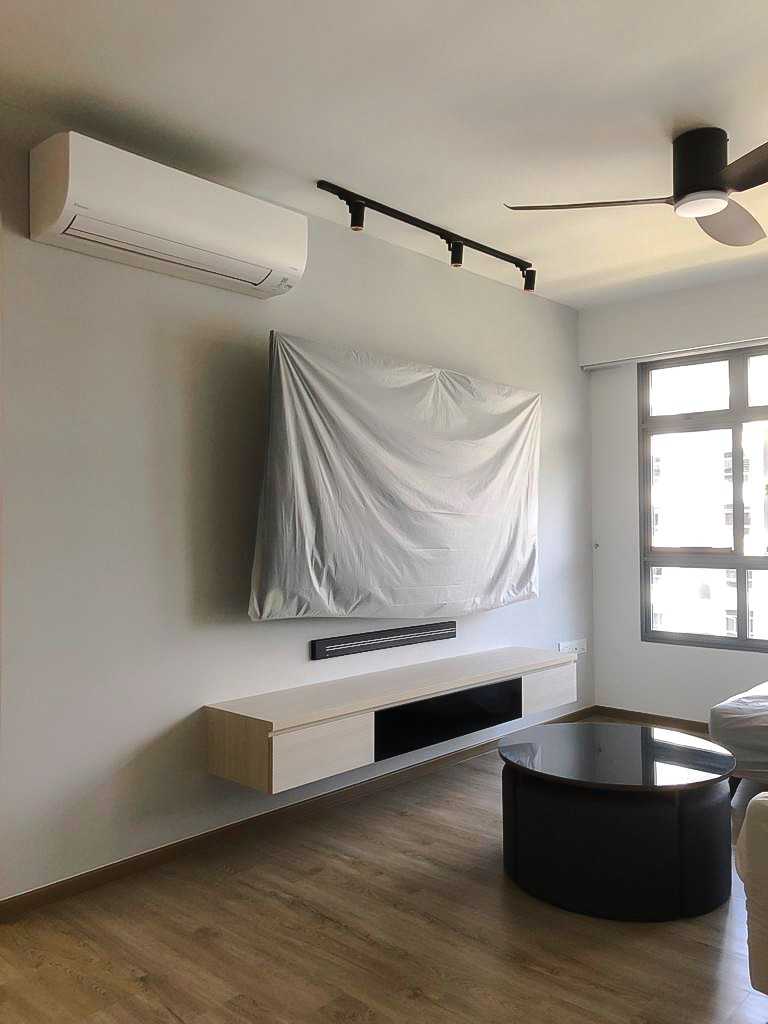 Scandinavian Living Room with TV Console and Window Grille