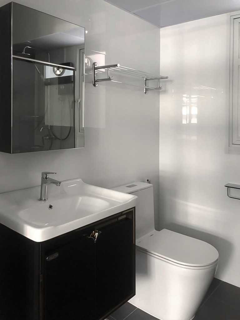 Scandinavian Bathroom with Mirror and Storage Cabinets