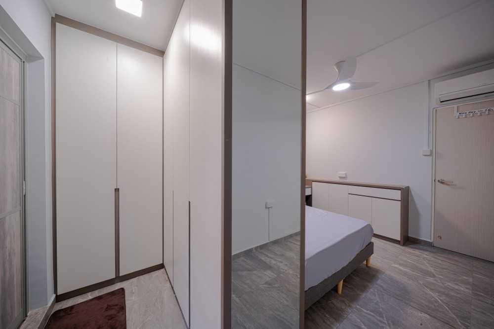 Minimalist Bedroom with Mirror and Ceiling Light