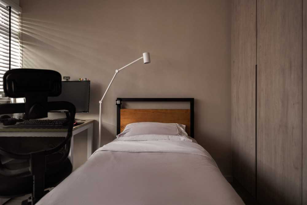 Industrial Bedroom with Storage Cabinets and Children's Beds