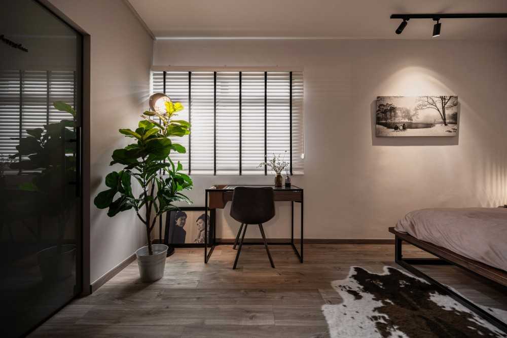 Industrial Bedroom with Carpet and Paintings
