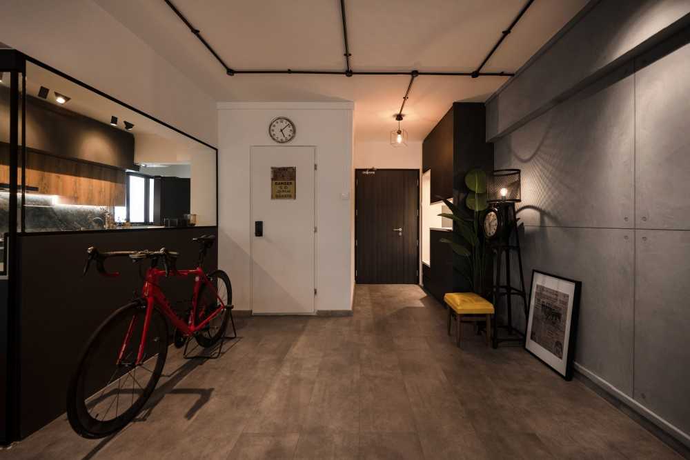 Industrial Entryway with Paintings and Stools