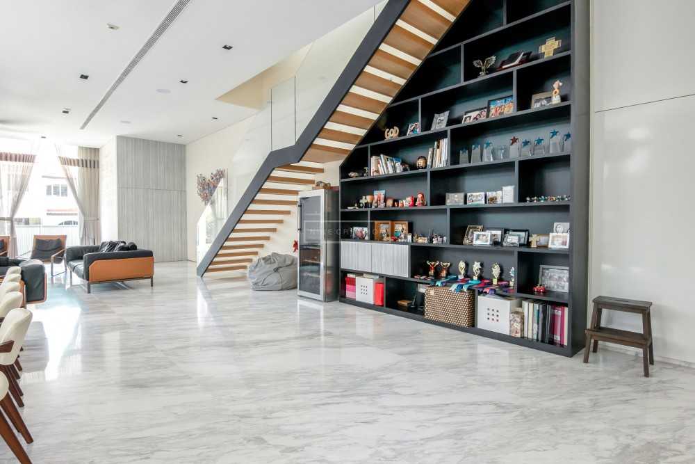 Modern Hallway with Bookshelf and Staircase