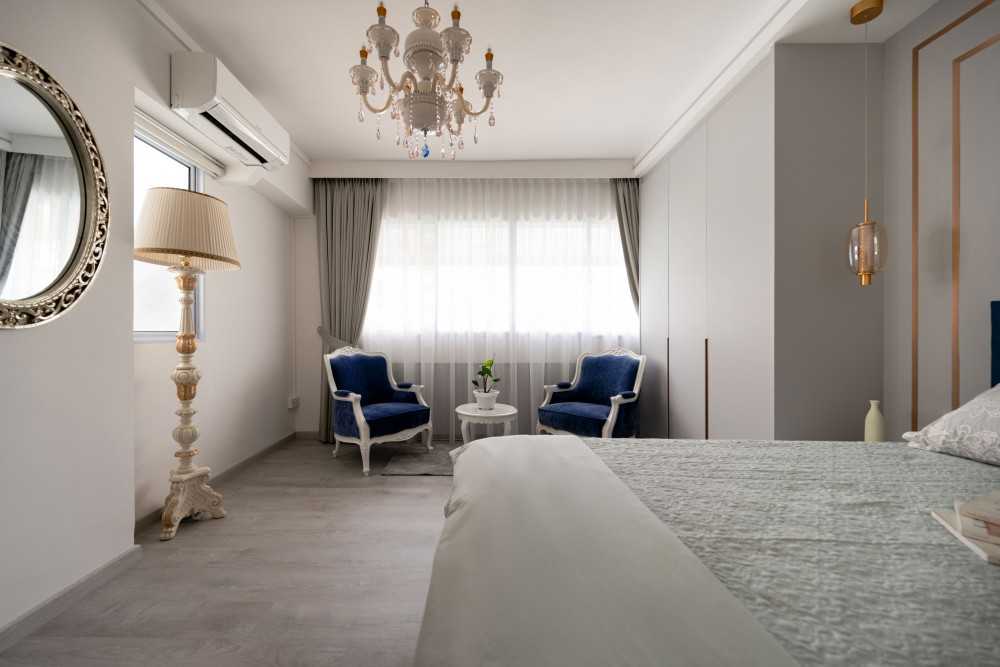 Modern Bedroom with Wardrobe and Chandelier