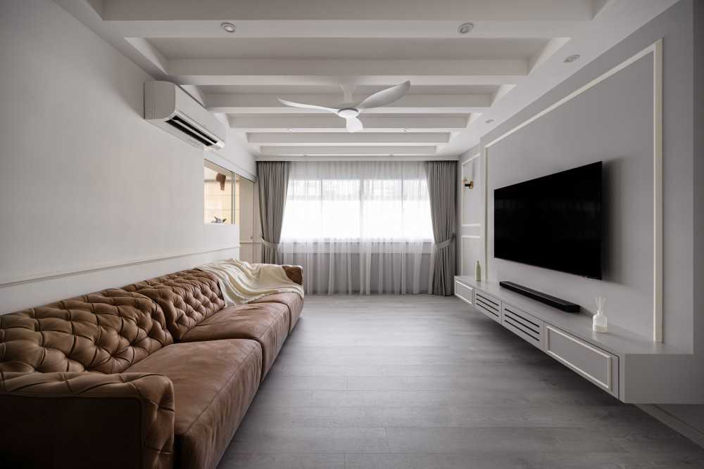 Modern Living Room with TV Console and Ceiling Light