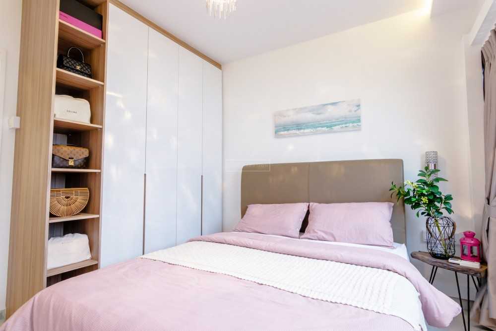 Contemporary Bedroom with Bookshelf and Wardrobe