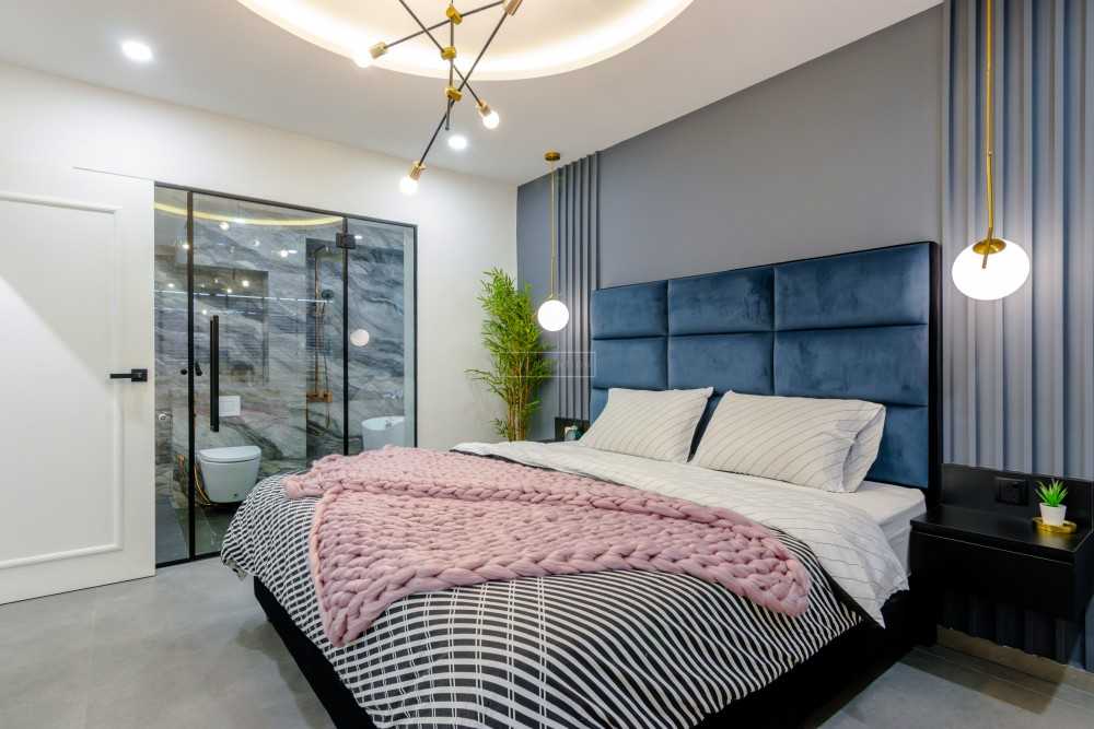 Contemporary Bedroom with Feature Wall and Cove Lighting