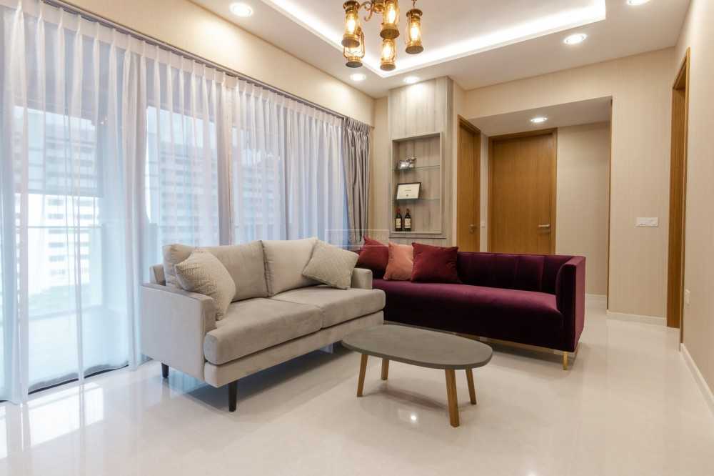 Modern Living Room with Homogeneous Tiles and Cove Lighting