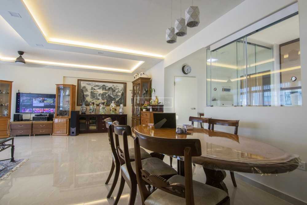 Minimalist Dining Room with Cove Lighting and Dining Table