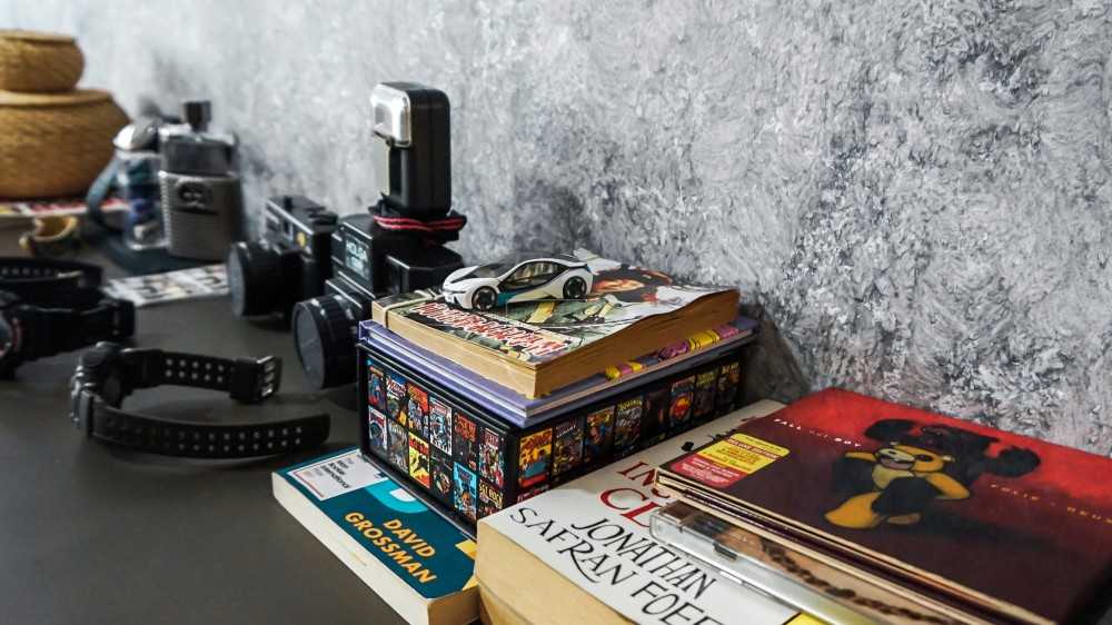 Industrial Gaming Room with Bookcases and Computer