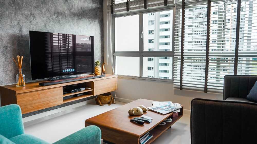 Industrial Living Room with TV Console and Feature Wall