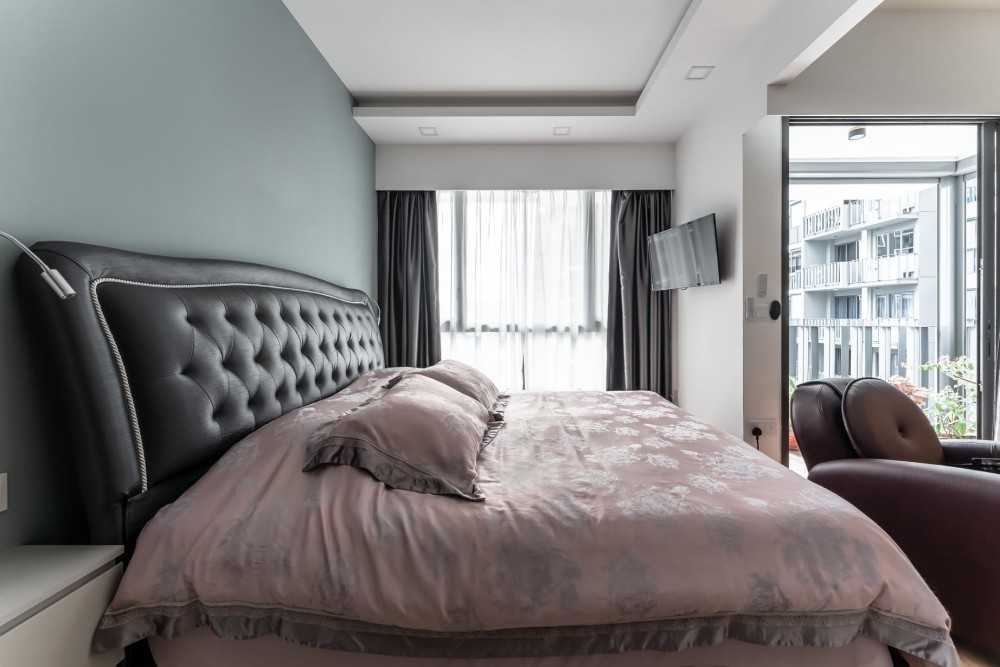 Contemporary Bedroom with Bookshelf and Parquet Floor