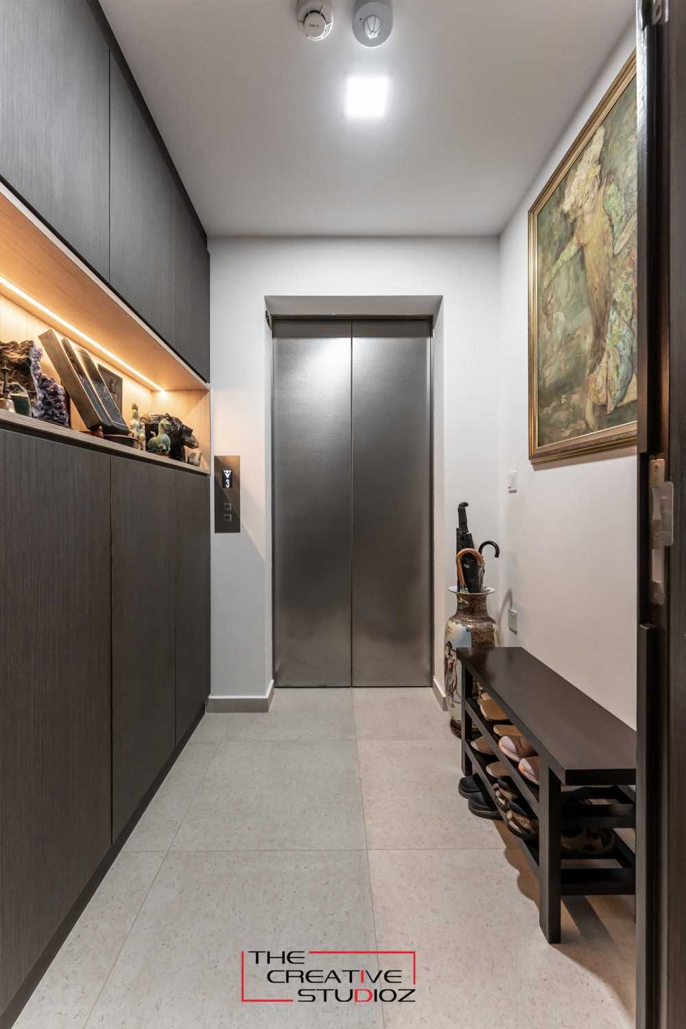 Contemporary Foyer with Artwork and Console Table