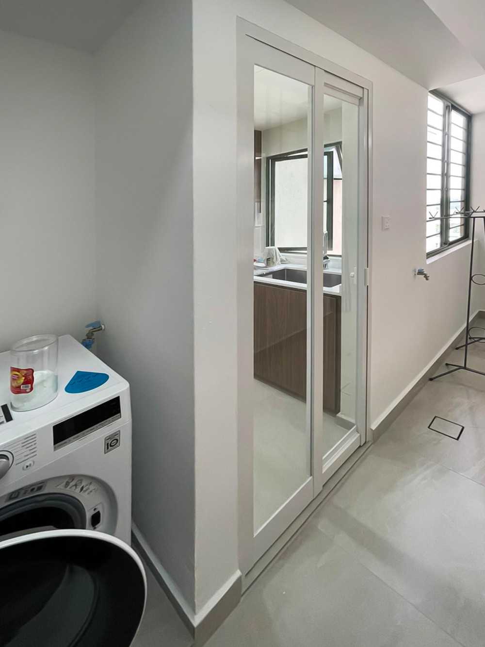 Scandinavian Kitchen with Glass Door and Washing Machine