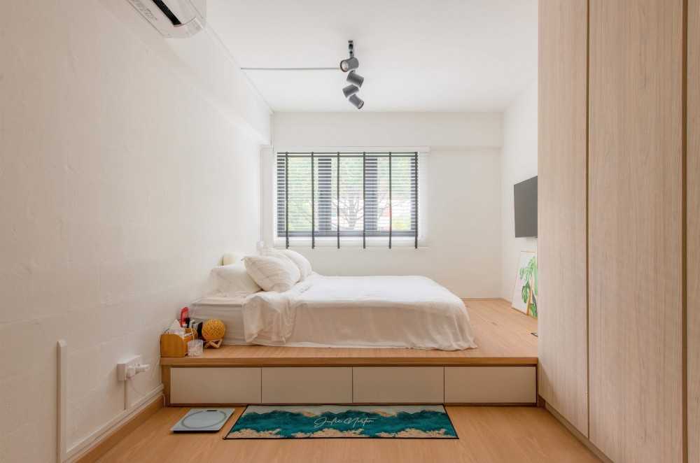 Scandinavian Bedroom with Platform Bed and Ceiling Light