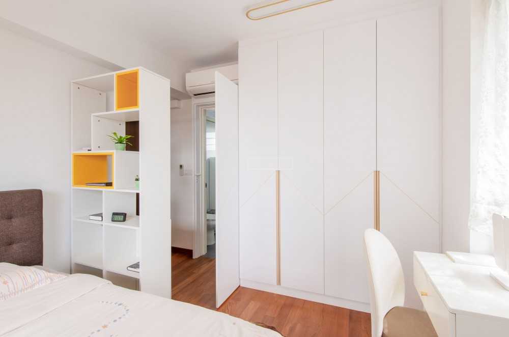 Modern Bedroom with Bookshelf and Wardrobe