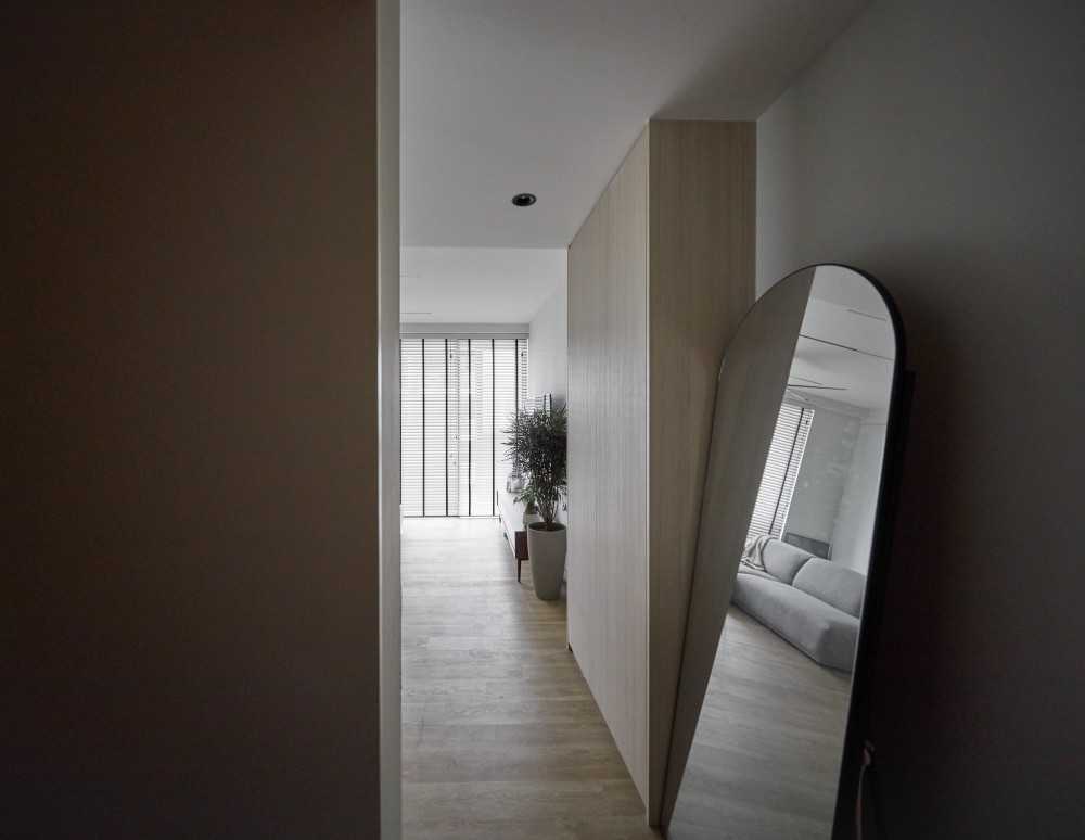 Scandinavian Living Room with Mirror and Storage Cabinets