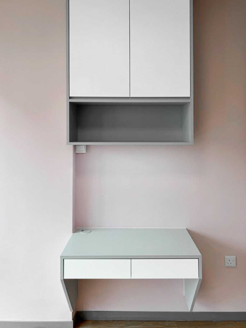 Scandinavian Bedroom with Paintings and Desk