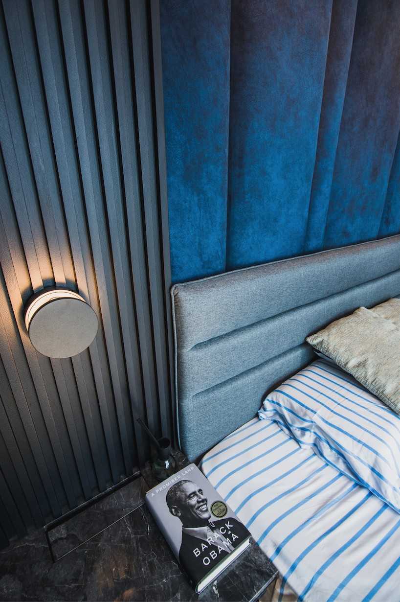 Eclectic Bedroom with Feature Wall and Mirror