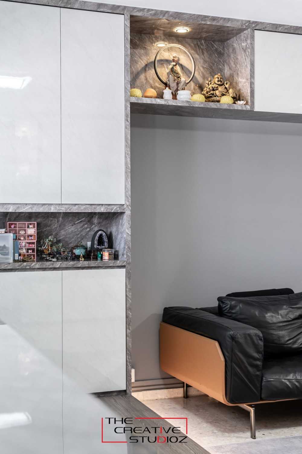 Modern Living Room with Bookshelf and Homogeneous Tiles