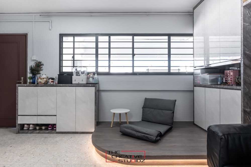 Modern Living Room with Homogeneous Tiles and Display Cabinets