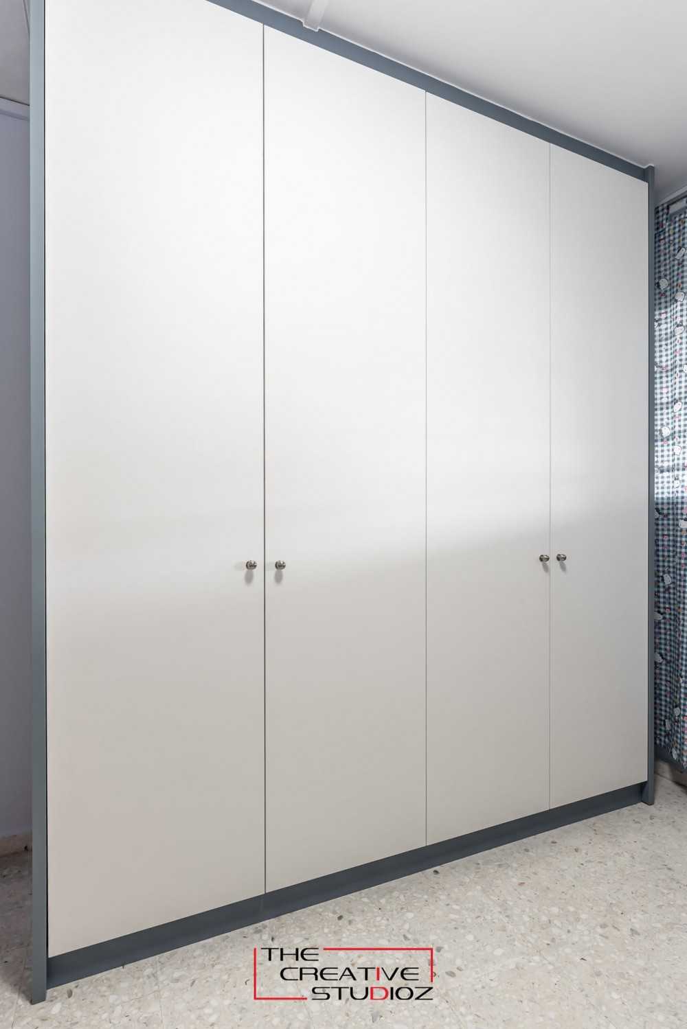 Modern Bedroom with Homogeneous Tiles and Wardrobe
