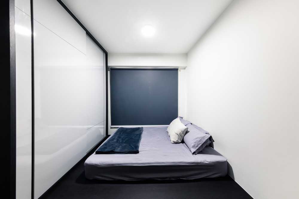 Modern Bedroom with Ceiling Light and Wardrobe