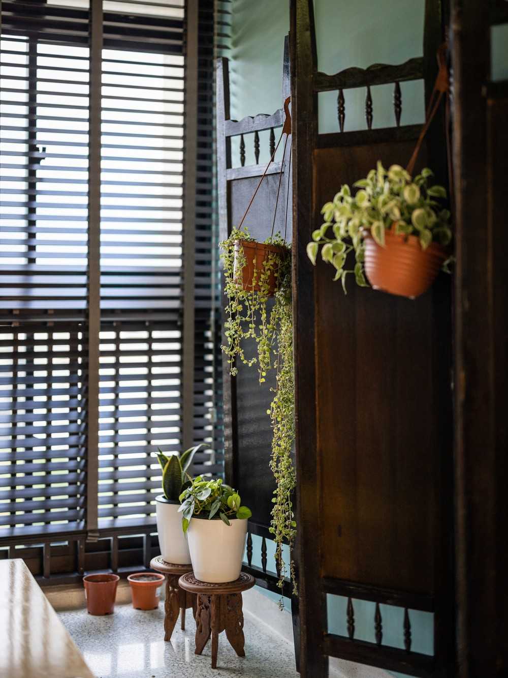 Eclectic Living Room with Feature Wall and Paintings
