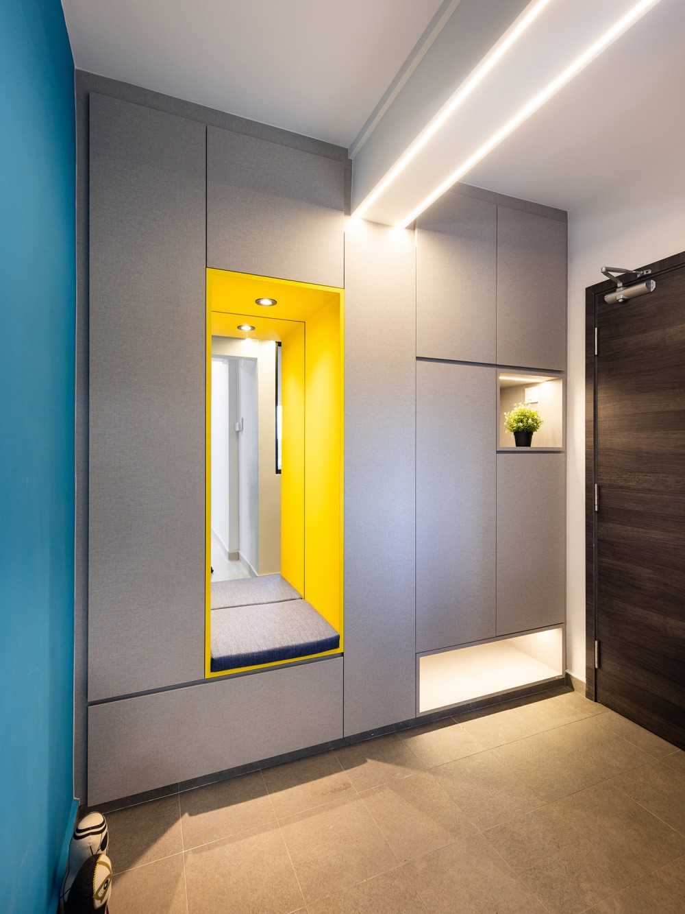 Eclectic Entryway with Mirror and Seating Bench