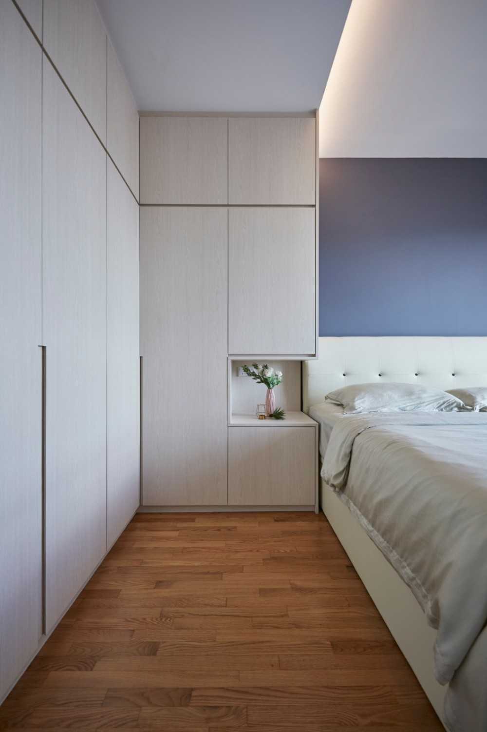 Contemporary Bedroom with Parquet Floor and Cove Lighting