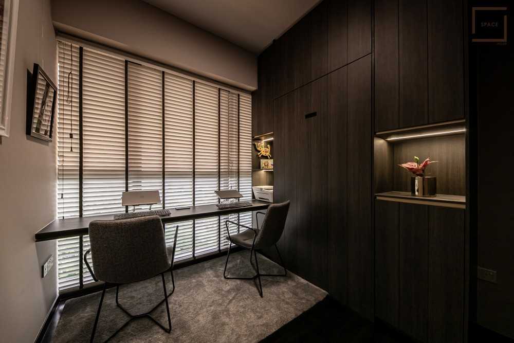 Modern Home Office with Bookshelf and Desk