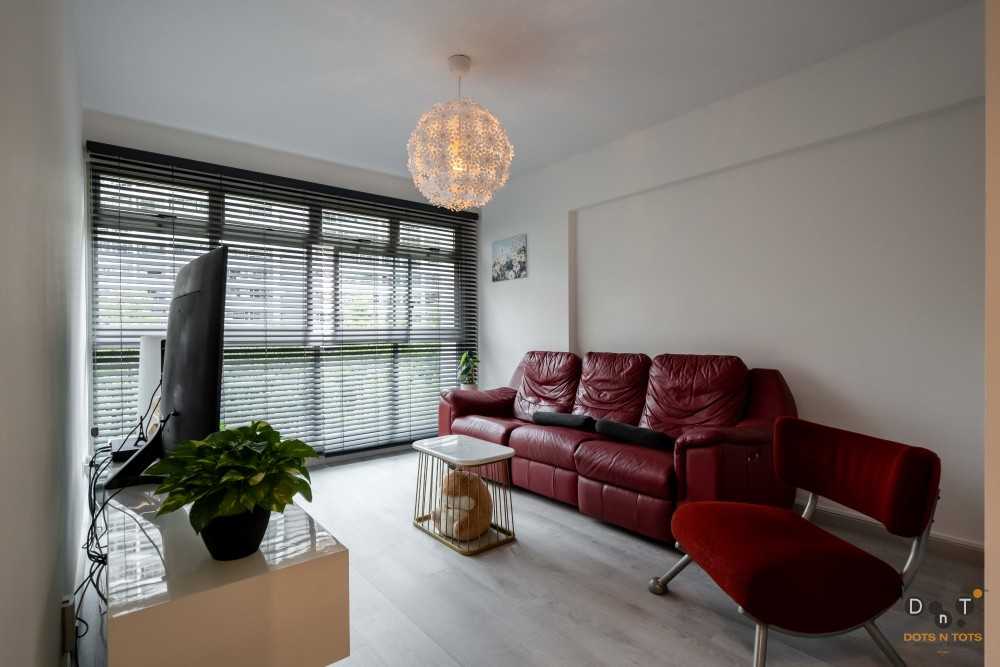 Modern Living Room with Drop Light and Bay Window