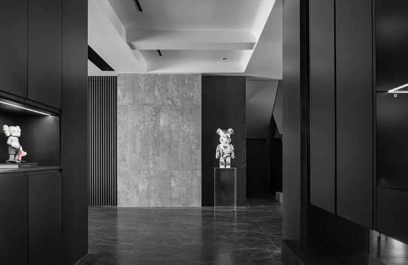 Contemporary Hallway with Homogeneous Tiles and Feature Wall
