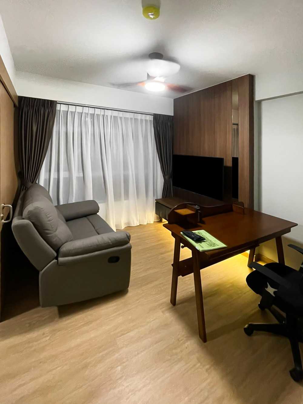 Scandinavian Living Room with TV Console and Window Grille