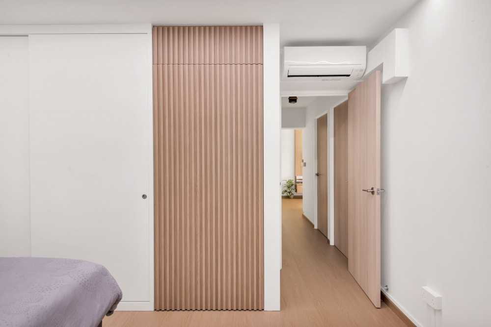 Minimalist Bedroom with Feature Wall and Wardrobe