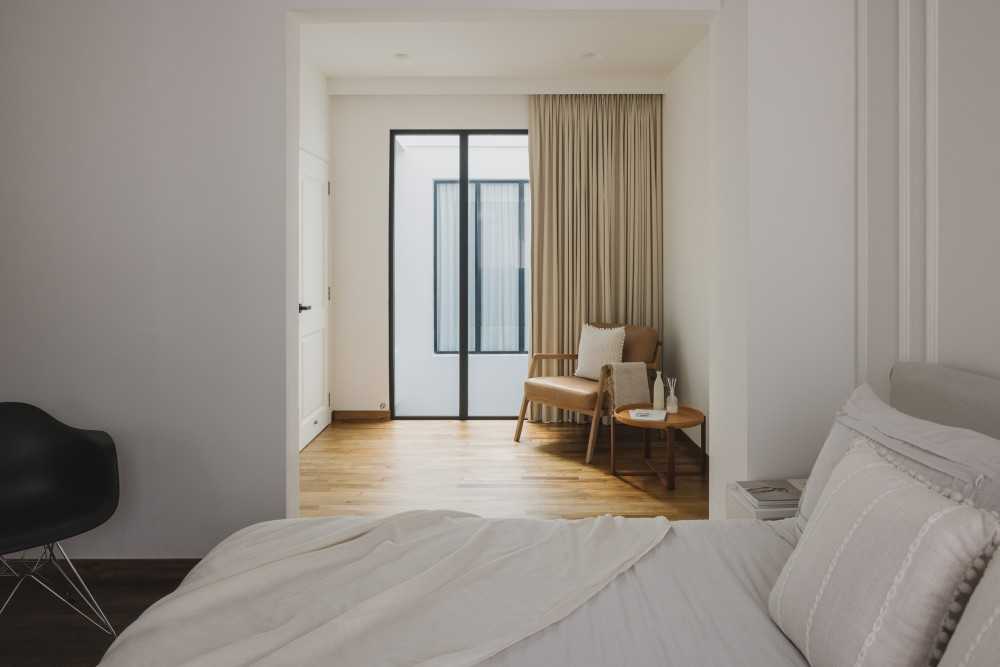Minimalist Bedroom with Parquet Floor and Curtain