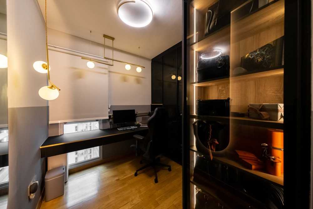 Contemporary Home Office with Bookshelf and Storage Cabinets