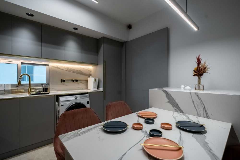 Contemporary Dining Room with Cove Lighting and Chandelier