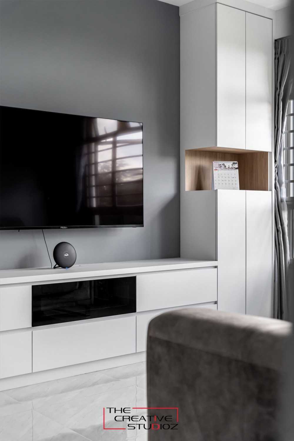 Minimalist Living Room with Homogeneous Tiles and TV Console