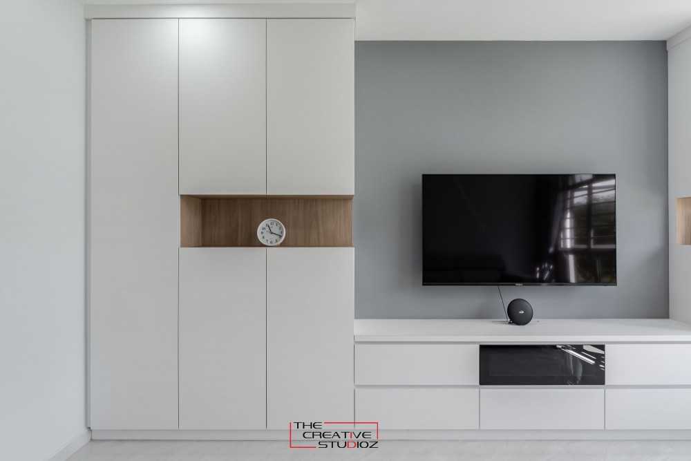 Minimalist Living Room with Homogeneous Tiles and TV Console